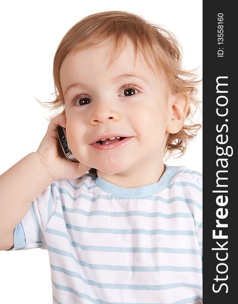 Little boy talking on the phone. Isolated on white background