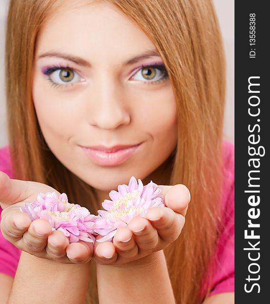 Girl holding flowers