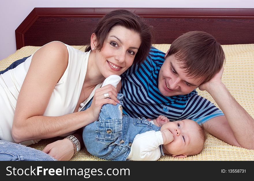 Family happy sitting on the sofa. Family happy sitting on the sofa