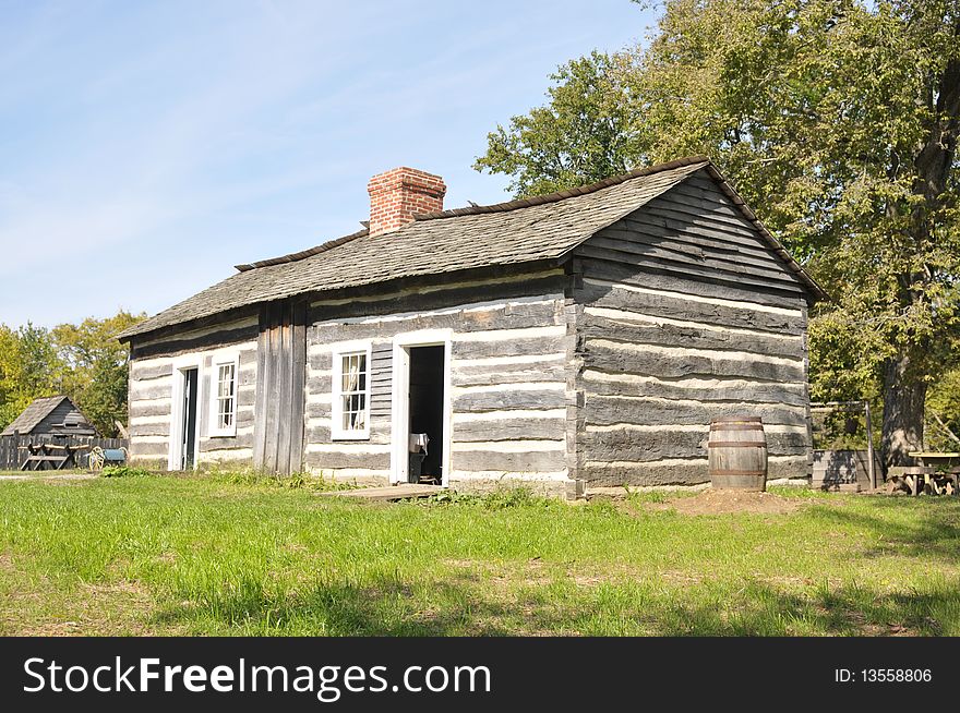 Replica of Thomas Lincoln's log cabin. He was the father of President Abraham Lincoln. In 1893, the original Thomas Lincoln log cabin was disassembled and shipped northward to serve as an exhibit at the World's Columbian Exposition in Chicago, Illinois. The original cabin was lost after the Exposition, and may have been used as firewood. However, the cabin had been photographed many times, and an exact replica was built from the photographs and from contemporary descriptions. The reconstruction of the Thomas Lincoln log cabin was completed in 1934.