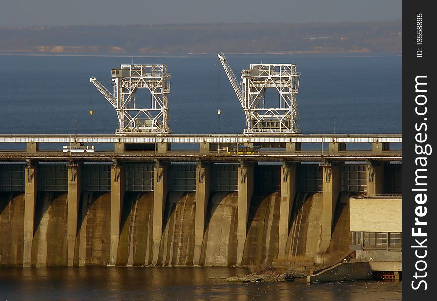 Overflow dam with two gantry crane standing above. Overflow dam with two gantry crane standing above