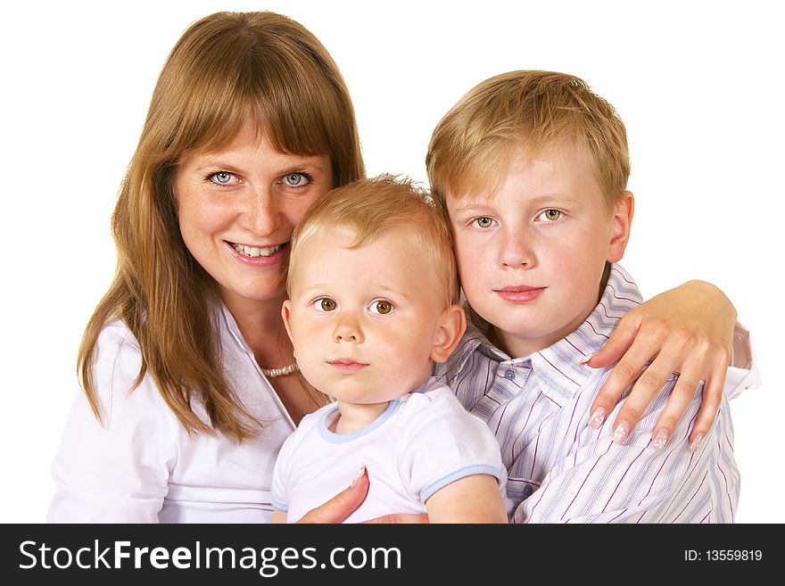 Portrait of mother and two sons over white