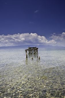 Decayed Jetty In A Lake Blue Skies Clear Water Wit Royalty Free Stock Images Decayed Jetty In A Lake Blue Skies Clear Water Wit Royalty Free Stock Images
