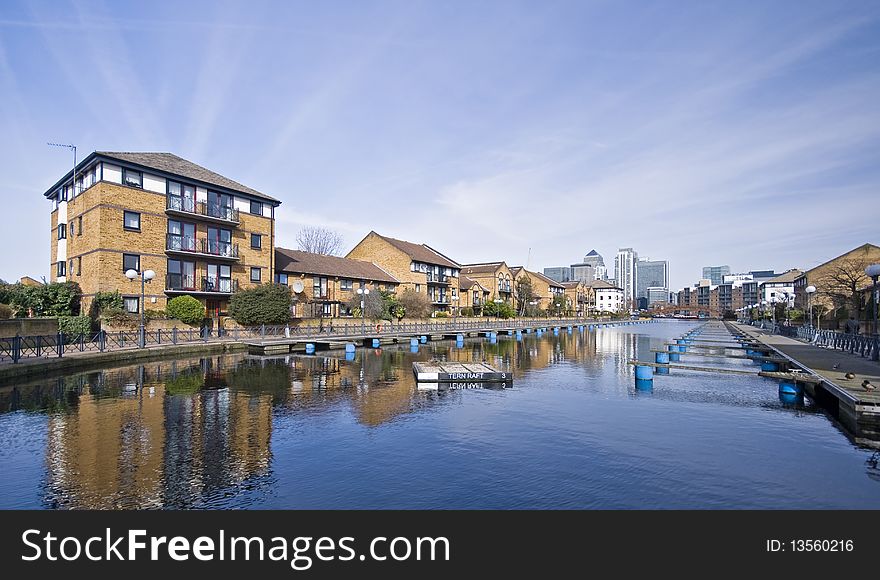 Residential development with water views by docks with marina