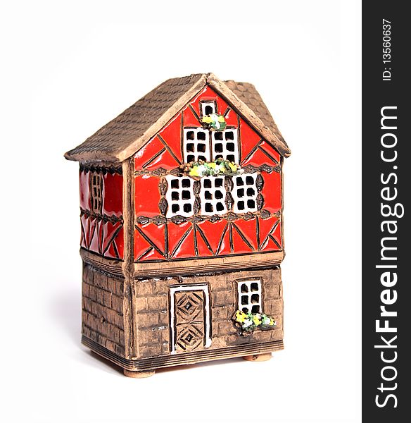 Little toy house isolated on the white