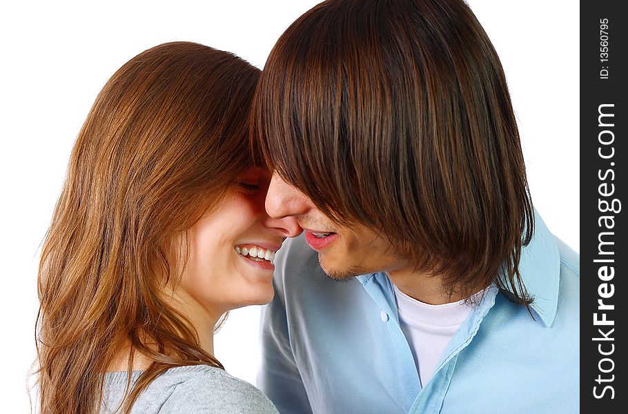 Portrait of a young couple in studio. Portrait of a young couple in studio.