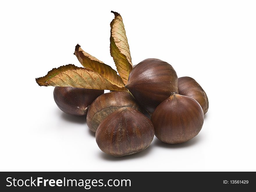 Chestnuts isolated on a white background. Chestnuts isolated on a white background.