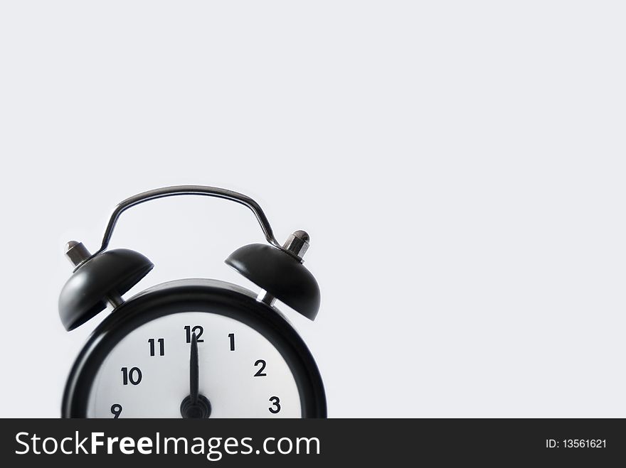 An alarm clock on white background