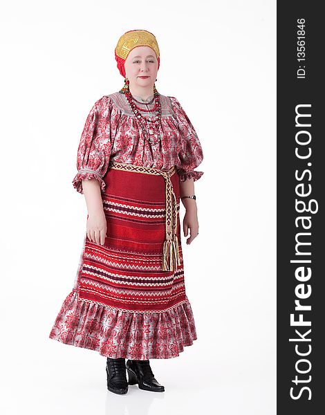 Woman in Russian handmade traditional clothing on isolated background. Woman in Russian handmade traditional clothing on isolated background