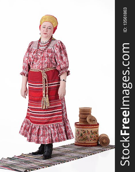 Woman in Russian handmade traditional clothing on isolated background. Woman in Russian handmade traditional clothing on isolated background