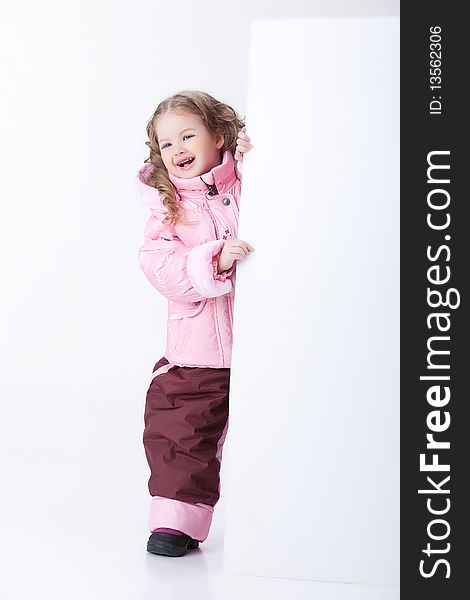 Little girl in comfortable clothing on isolated background. Little girl in comfortable clothing on isolated background
