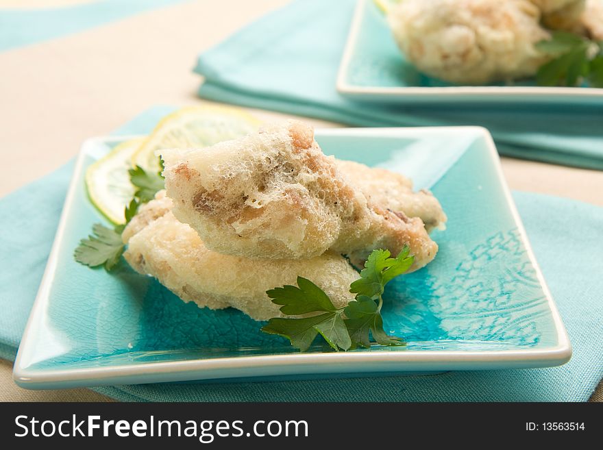 Chicken wings fried in light crispy tempura batter. Chicken wings fried in light crispy tempura batter