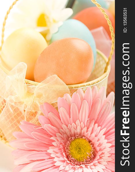 Colorful easter arrangement with flowers and eggs