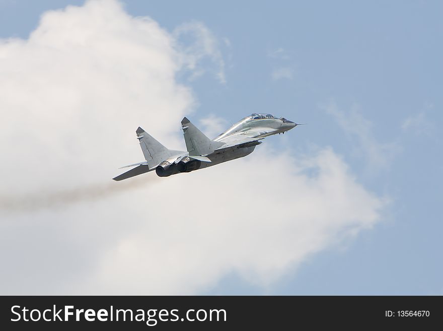 Russian military airplane flying in a blue sky. Russian military airplane flying in a blue sky