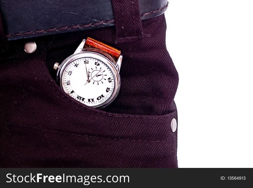 Silver watch in black jeans pocket isolated on white. Silver watch in black jeans pocket isolated on white