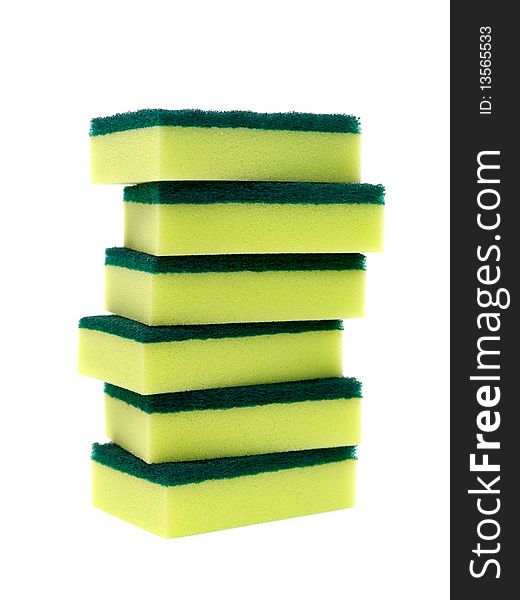 Household scourers stacked and isolated against a white background