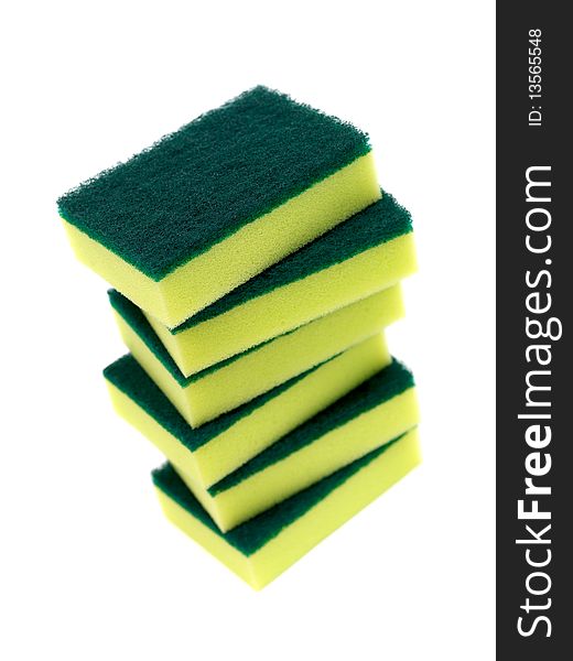 Household scourers stacked and isolated against a white background