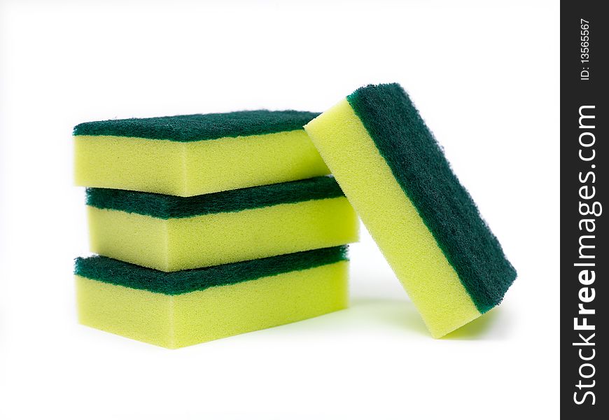 Household scourers stacked and isolated against a white background