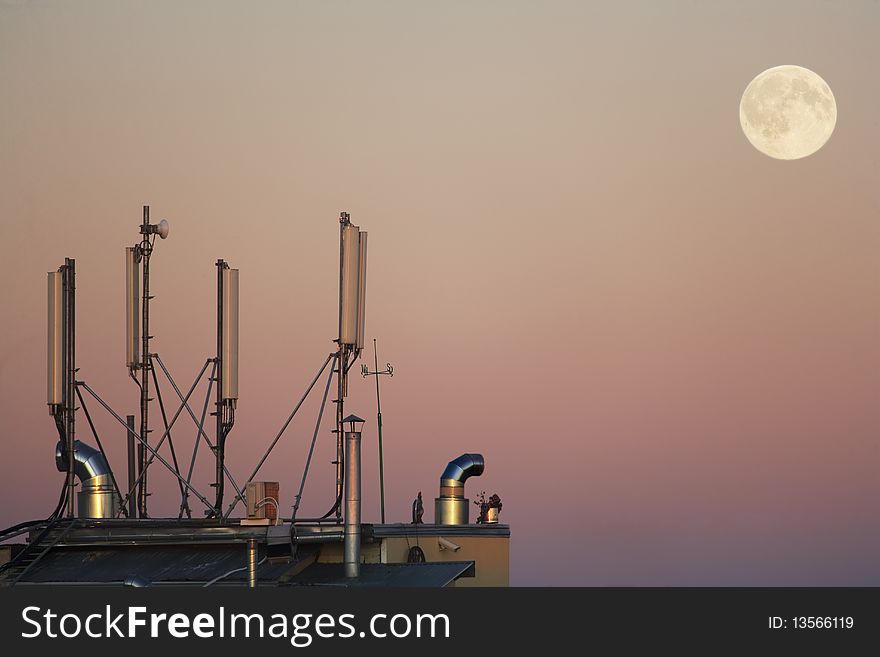 Moonrise on the city sky