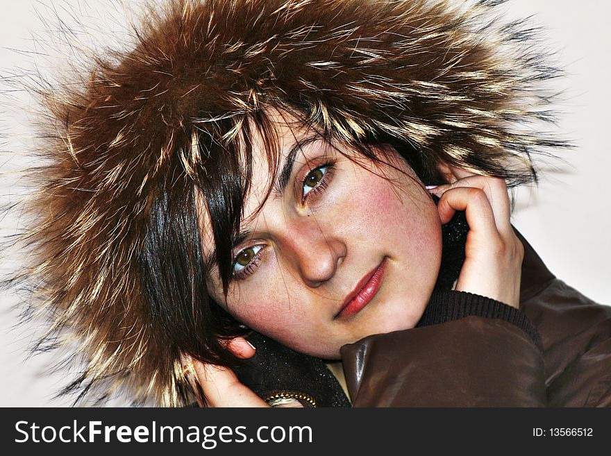 Young girl in fur hood