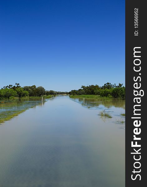 Road from St George QLD flooded after heavy rain in the area and further north. Road from St George QLD flooded after heavy rain in the area and further north