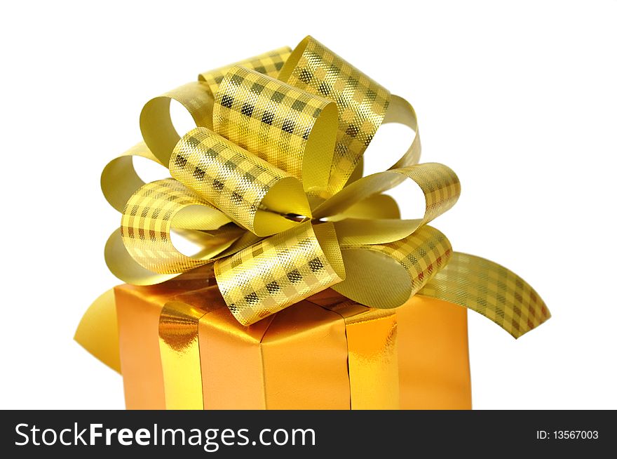 Golden gift isolated on white background
