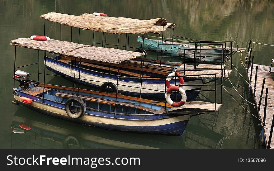 A peaceful image of docked boats at lake of Matka -Skopje