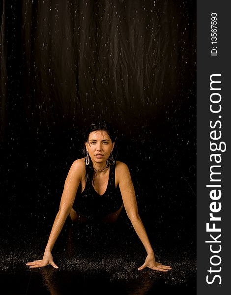 Full length portrait of a woman in water studio. Full length portrait of a woman in water studio