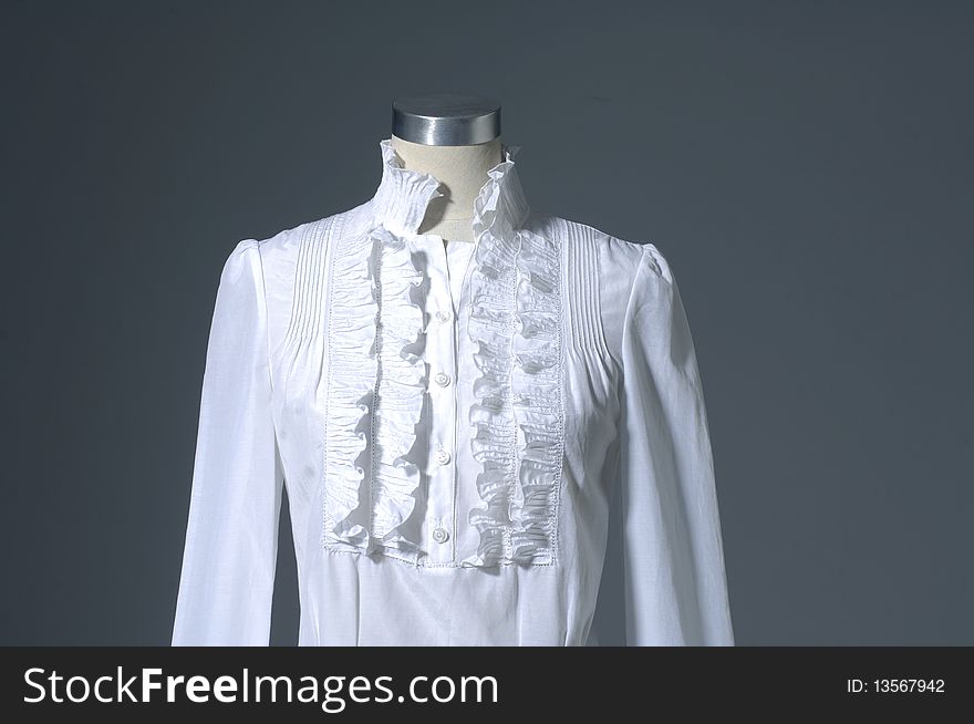 Woman shirt on mannequin on light background