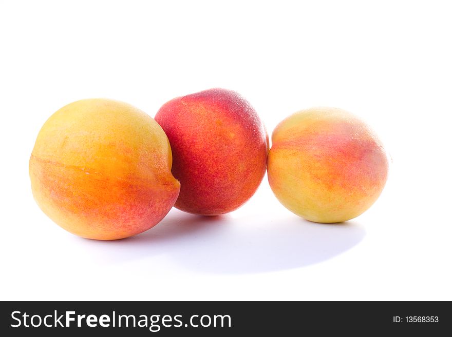 Juicy Peaches isolated on white