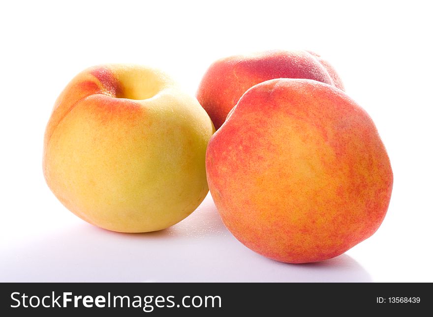 Juicy Peaches isolated on white
