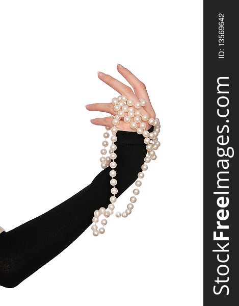 Luxury pearls in the woman's hand as a lot on the public sale
