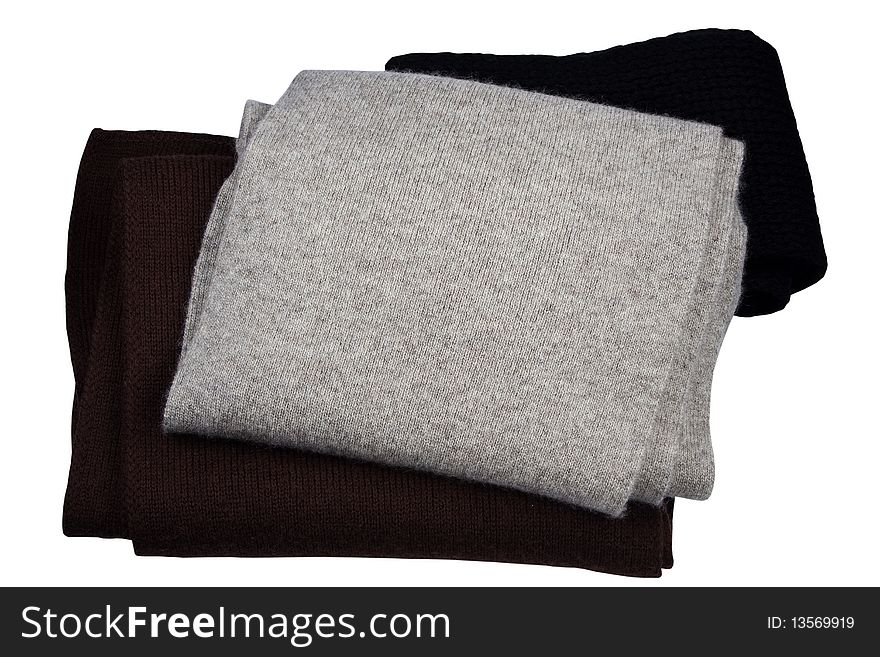 Three woolly scarfs are insulated on white background