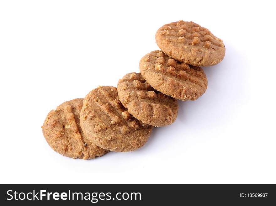 Many pieces of cookies isolated on white background.