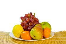 Ripe Fruits In Plate On Table Royalty Free Stock Image