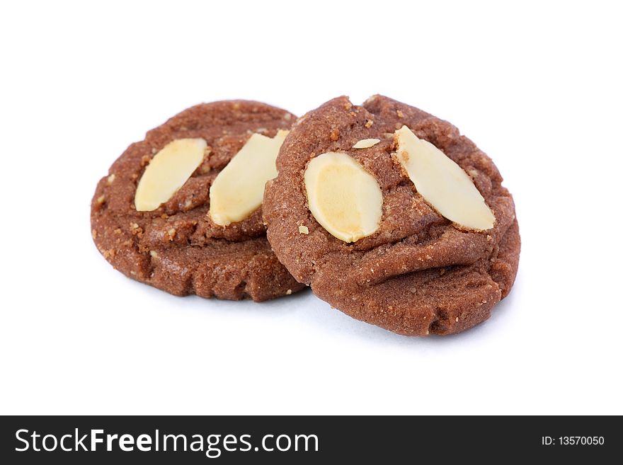 Two pieces of almond cookies isolated on white background.