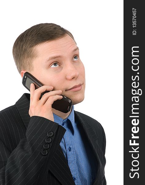 Businessman talking on his mobile phone isolated on a white