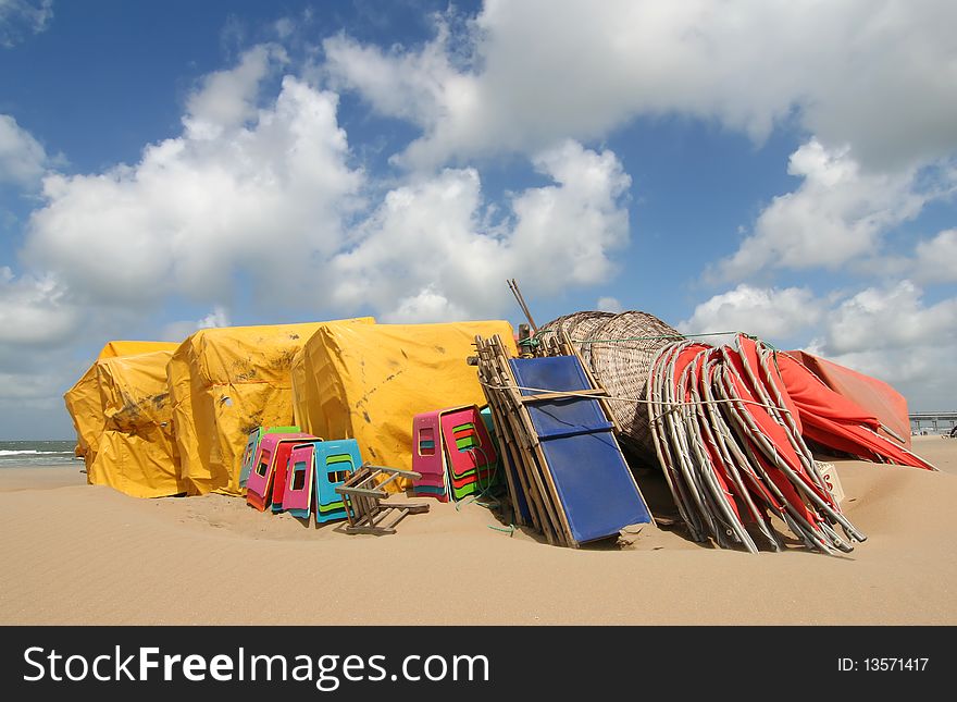 Stacked beach chairs on the beach at Scheveningen, Holland