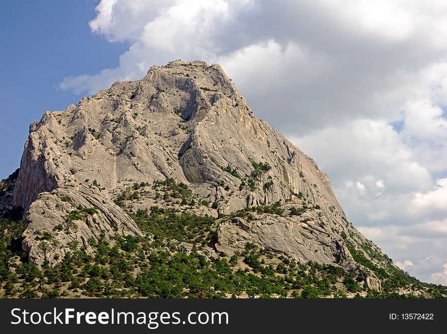 Falcon mountain over New World town, Crimea. Falcon mountain over New World town, Crimea.
