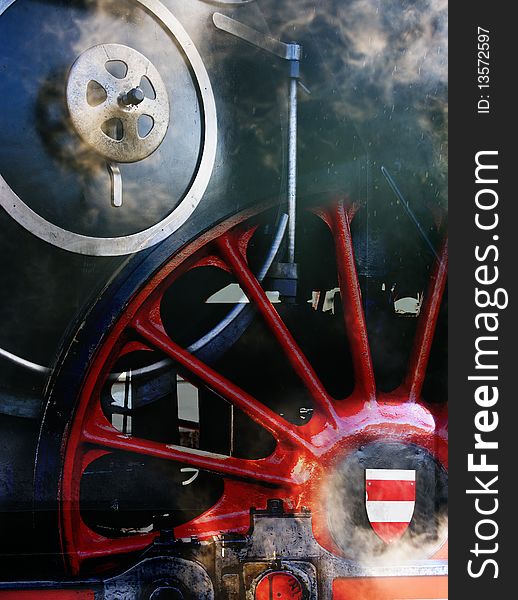 Abstract - steam locomotive boiler and steam locomotive wheel.