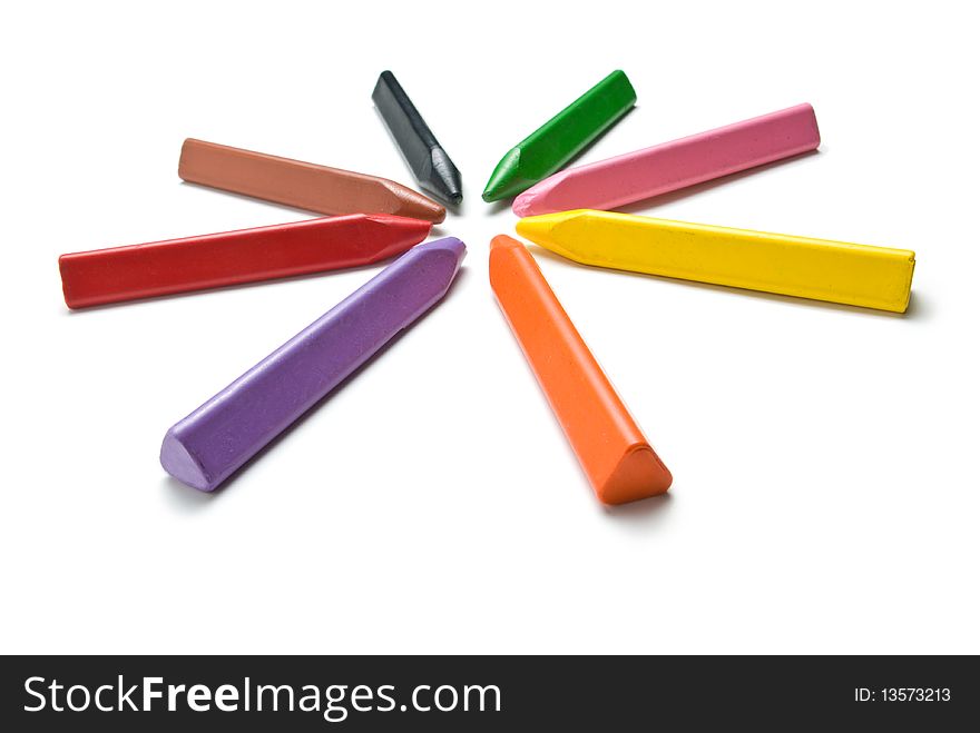 Multicolored crayons. Isolated on white background.