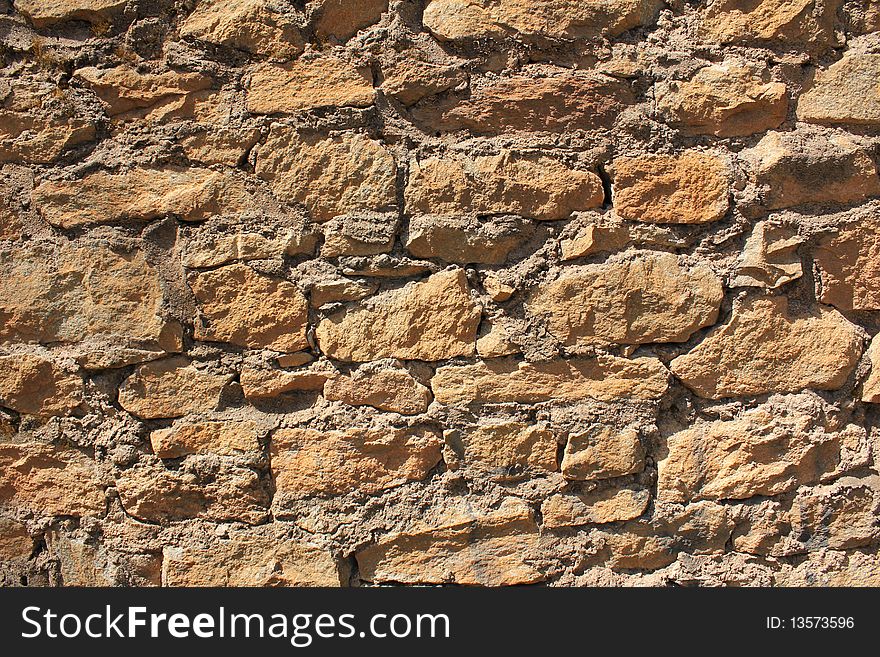Close up of a brown stone wall