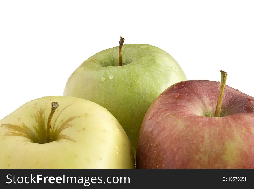 Three apples on a white background