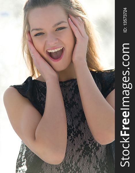 Happy young female smiling while outdoors