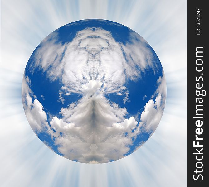 Vew of puffy clouds in blue sky in shape of globe. Vew of puffy clouds in blue sky in shape of globe