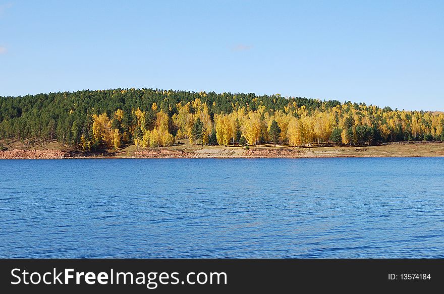 The image of river and autumn forest