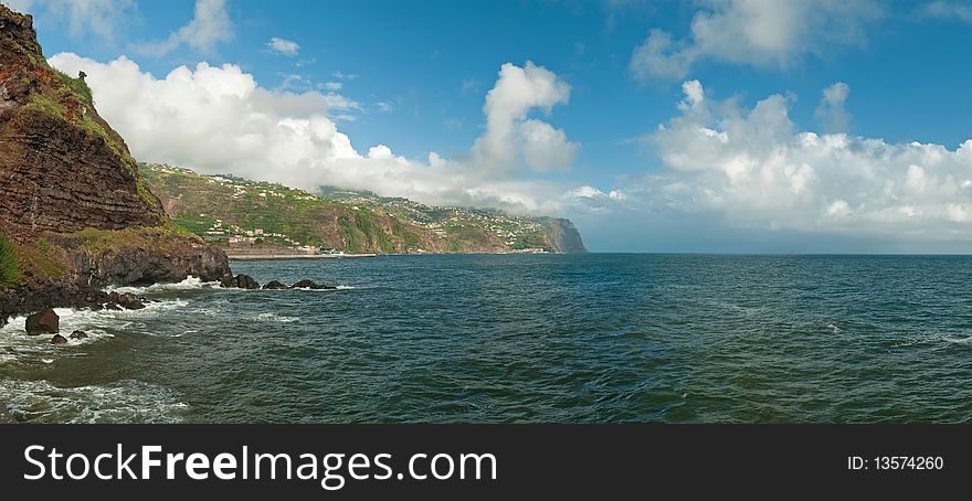 Cliffs surround a bay on Madeira Island, Atlantic ocean