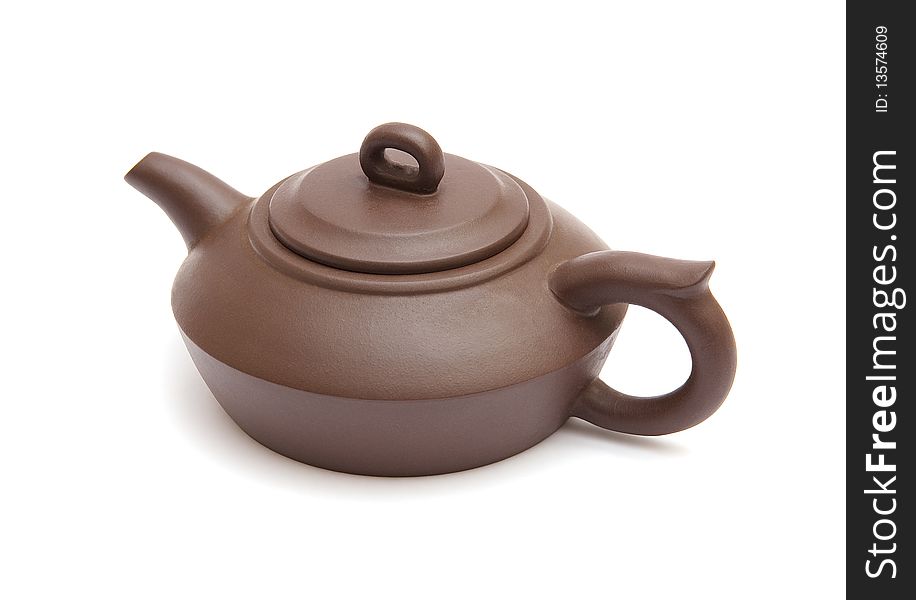 The image of the brown teapot isolated on white