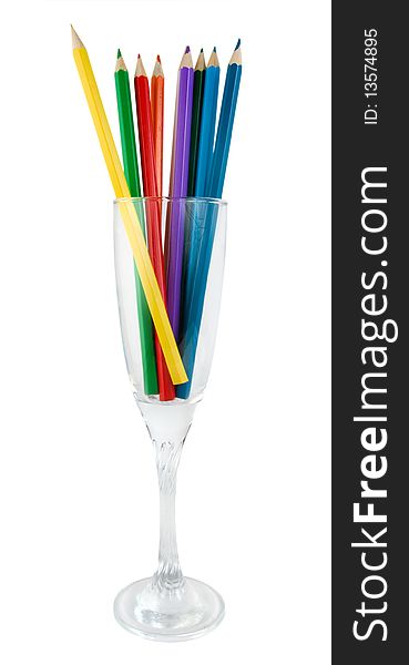 A glass with colored pencils isolated on a white background