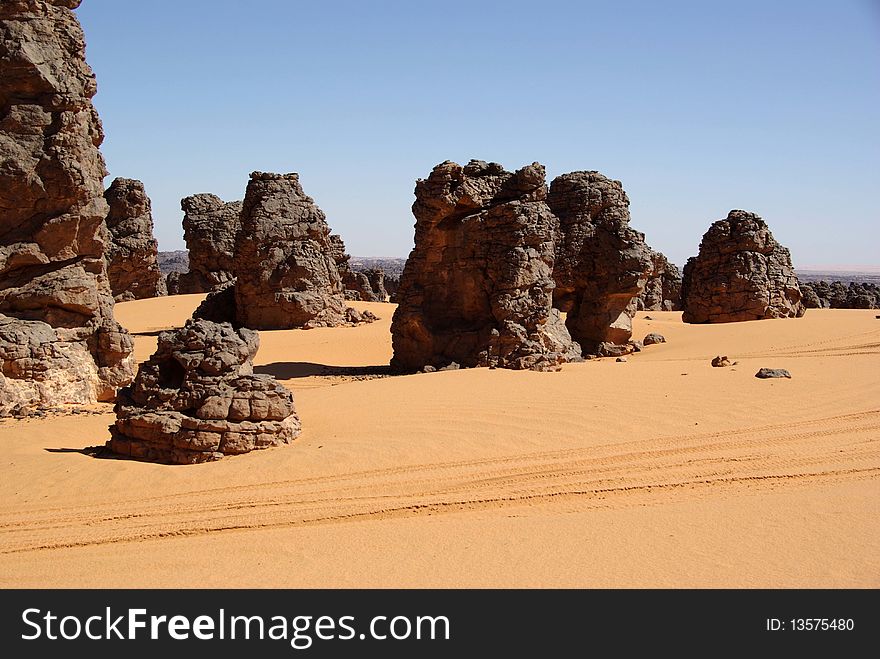 Sandstone peaks in the desert of Libya, in Africa. Sandstone peaks in the desert of Libya, in Africa